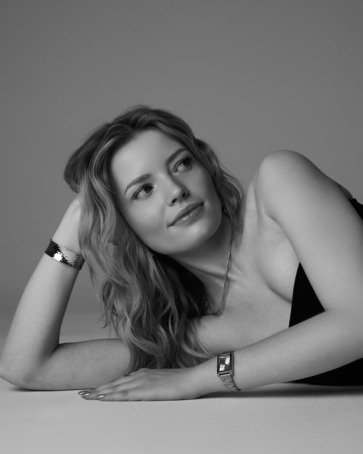 Mariat lying on the floor, black and white
